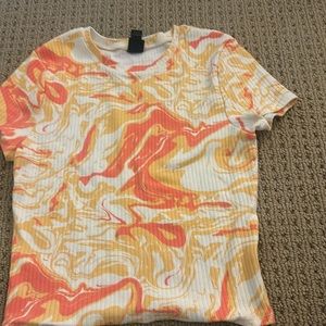 Multiple pairs of shirts, pants and jackets